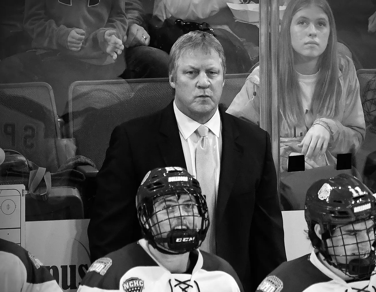 Minnesota Duluth men's hockey coach Scott Sandelin behind the Bulldogs bench